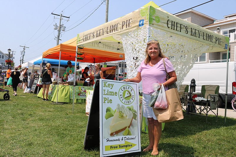 Barbara Serge, of Ocean View, is anxious to taste the key lime pie that she bought.