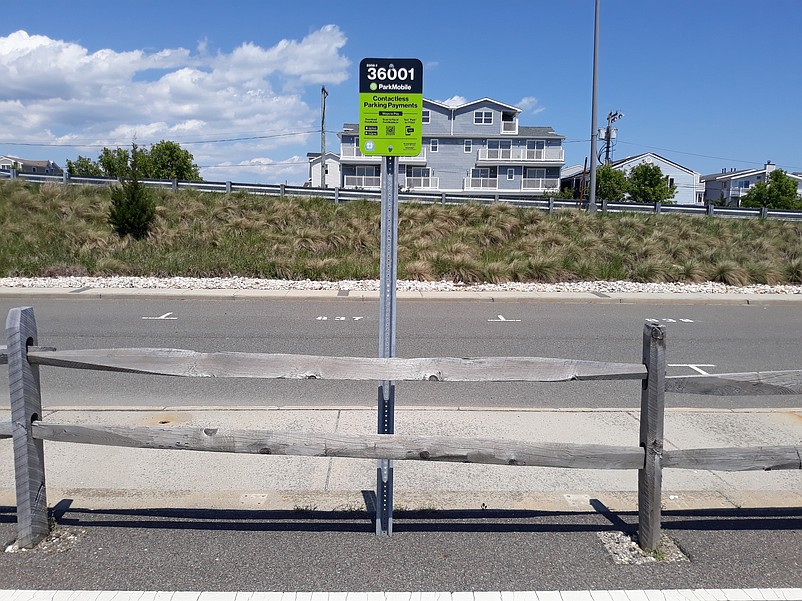 ParkMobile app signs are now a common sight throughout Sea Isle City as more people transition to the cashless system to pay for parking.