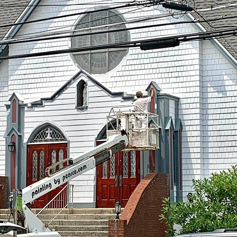 The church's exterior is repainted as part of the renovation work. (Photo courtesy of the Save Our Historic St. Joseph's Church Facebook page)