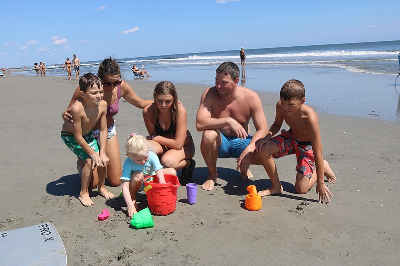 The Wrazen family, of West Chester, Pa., make the most of their beach time before ending their summer vacation.