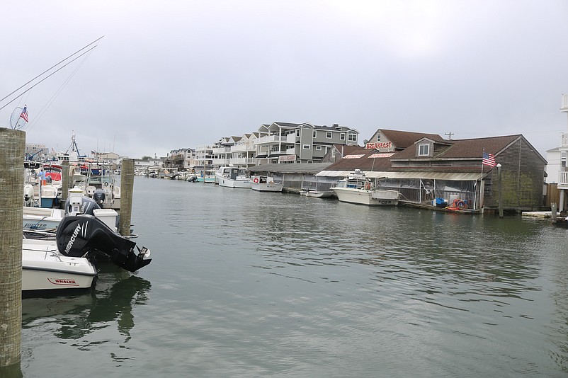 Dredging will clear muddy sediment from the lagoon and boat slips at the municipal marina.