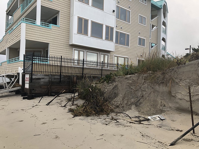 The protective sand dune next to the Townsend Shoals condominium complex is being eaten away. (Photo courtesy of Joseph Civitillo)