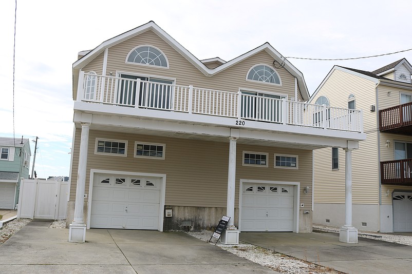 This duplex at 220 40th Street is part of the sale and has a list price of $1.8 million.