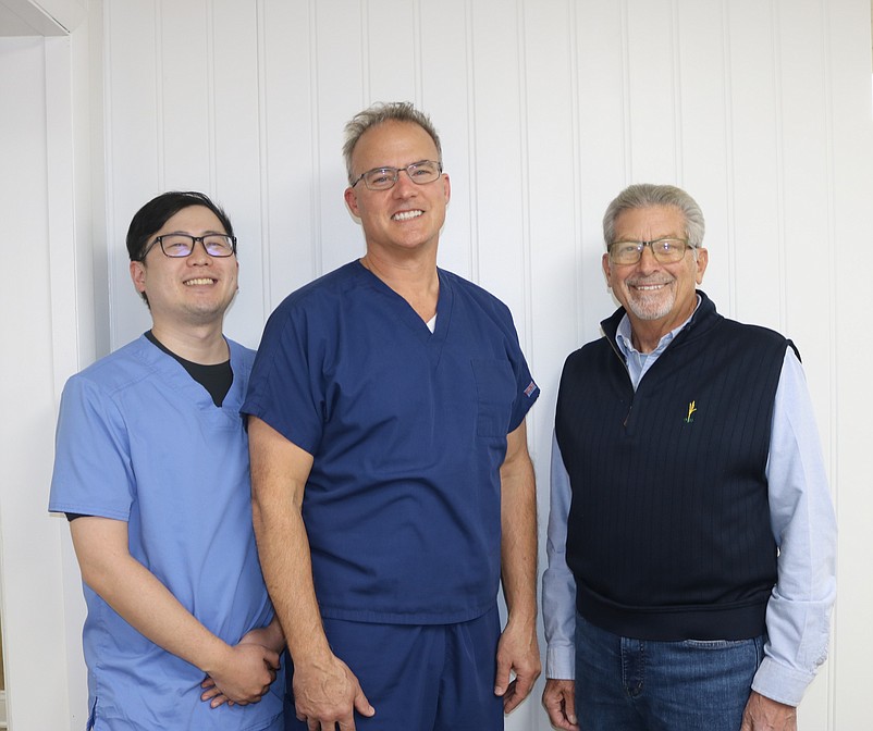 Dr. William Panico, center, with Dr. Andrew Hong, left, and retired dentist, Dr. Albert Porreca, at Panico Dental in Ocean City.                       