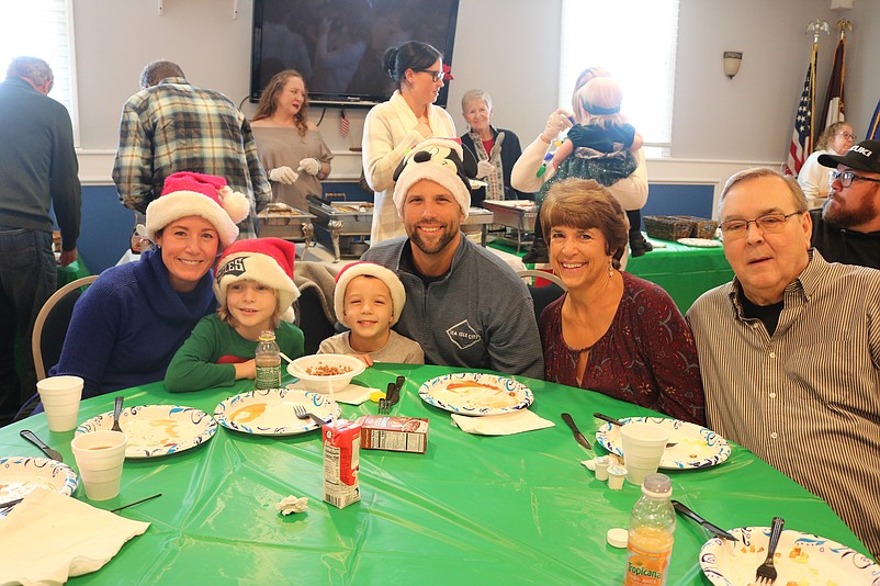 Nicole and Bryan Strohl, of Denver, Pa., and their children Kellen, 7, and Owen, 5, enjoy breakfast with grandparents, Bonnie and Jim Strohl.