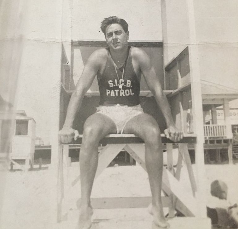 Andy Sannino seated on the lifeguard stand in 1941. (Photo courtesy of the Sannino Family)