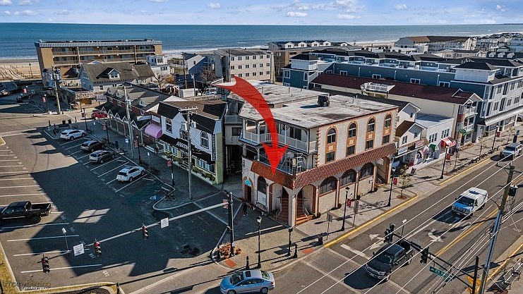 The building's high-profile location, depicted by the red arrow, is at the corner of John F. Kennedy Boulevard and Landis Avenue. (Photo courtesy of Long &amp; Foster)