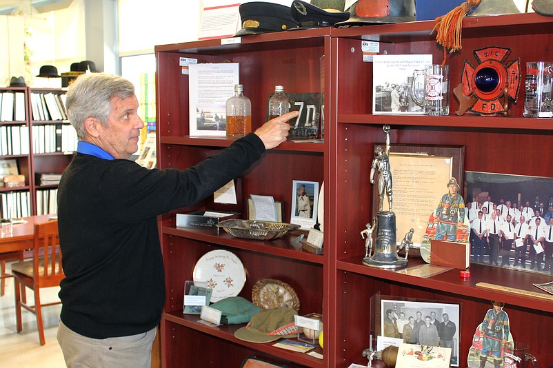 Historical Society President Ron Kovatis explains one of the many artifacts visitors can find inside the Museum at 4800 Central Avenue.