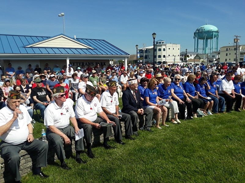 Hundreds of spectators join the Memorial Day ceremony at Veterans Park.