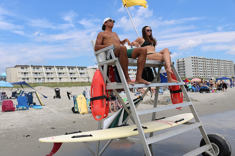 Lifeguards Dan Porter and Kaylee Dougherty protect swimmers at the 40th Street beach in 2022.