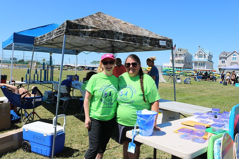 Ammer Plett, left, and Annemarie Kaiser, help out at the fundraiser.