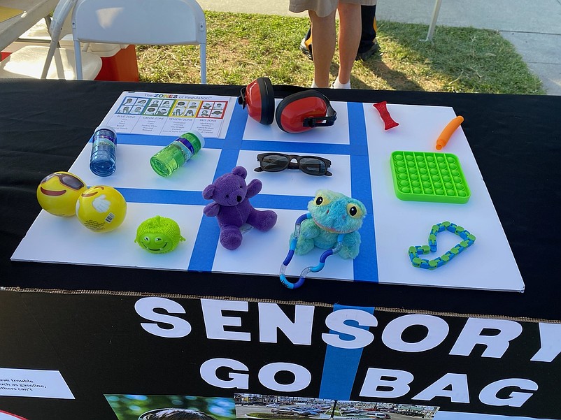 Items ranging from sunglasses to noise-canceling headphones to small toys are included in the sensory bags,