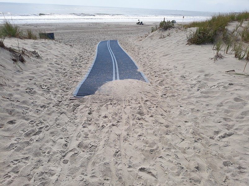 The mat at 77th Street, where Pat Walsh and Eileen O'Hare go to the beach.