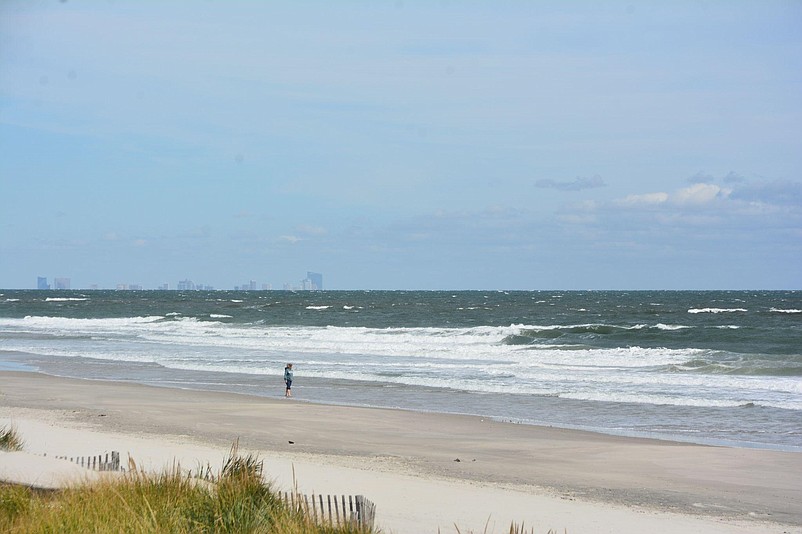 Beachcombers enjoy stepping barefoot into the warm water. (Photos courtesy of Adriana Alfaro)