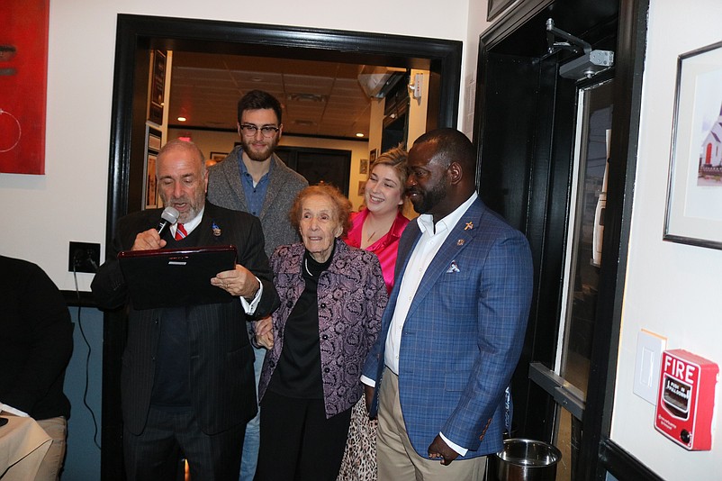 Sea Isle City Mayor Leonard Desiderio, left, presents the 2022 Republican of the Year award to Assemblyman Antwan McClellan, at right.