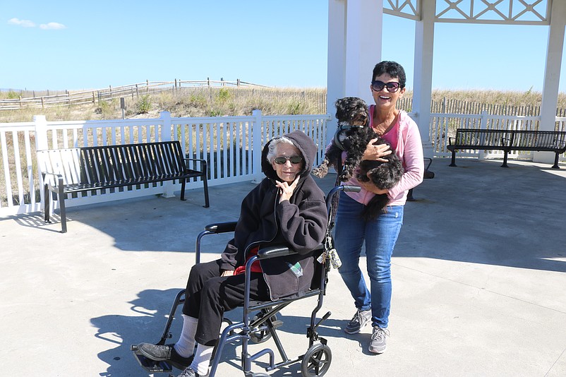 Mary LaRosa and her mother, Rose LaRosa, enjoy an outing on Sea Isle's Promenade with Tobi.