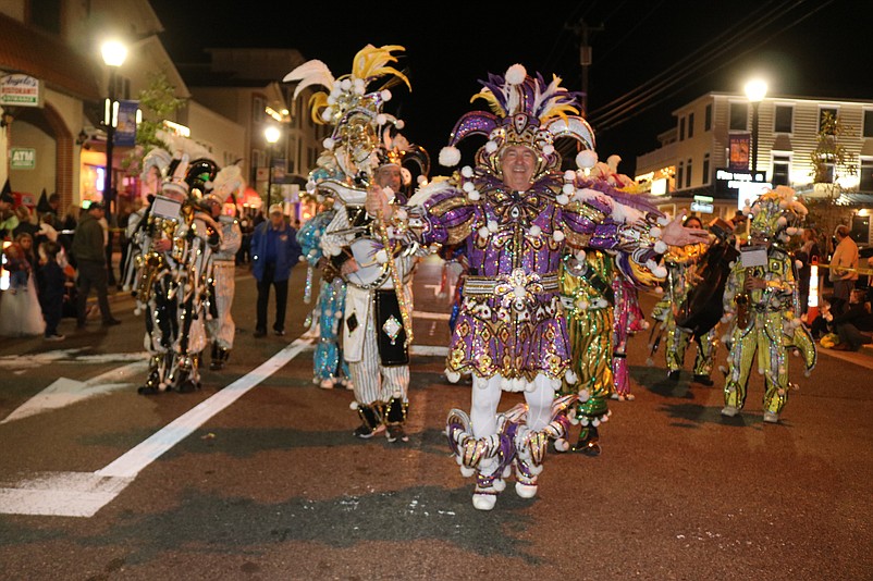 The Pennsport String Band entertains the crowds with Mummers music.