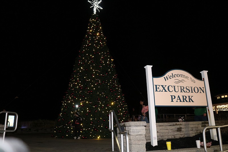 The towering holiday tree is the centerpiece in Excursion Park.