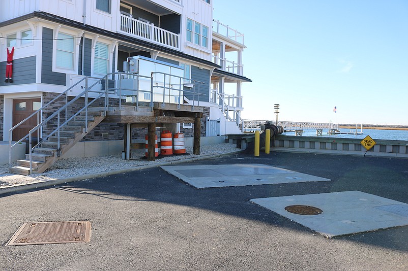 The city's first stormwater pumping station, largely hidden underground, helps to protect a flood-prone area at the bay end of 38th Street.