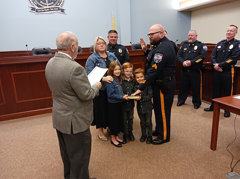 Sgt. Nicholas Giordano is joined by his wife, Shannon, and their children, Gracelynn, Giovanni and Vincenzo, while being sworn in by the mayor.