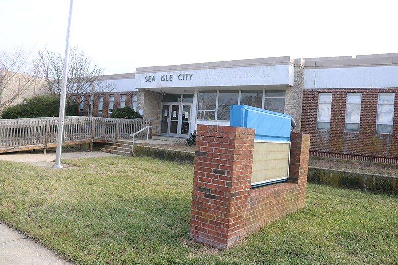 A photo taken in January 2023 shows the front of the school before a demolition fence was erected around the site.