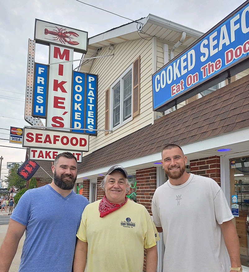 Mike's Seafood &amp; Dock Restaurant owner Mike Monichetti, center, is joined by Jason and Travis Kelce in Sea Isle. (Photo courtesy of Mike Monichetti)