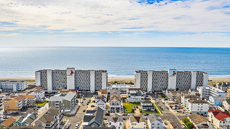 An aerial view shows the north and south towers of the Spinnaker Condominiums.