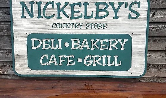 A sign invites Nickelby's customers to the deli, bakery, cafe and grill.