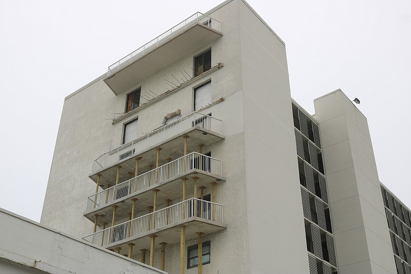 The balconies on the seventh and eighth floors have been removed.