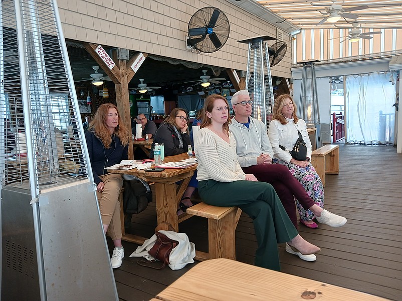 Members of the Chamber of Commerce listen to Savastano's remarks during their meeting at Mike's Seafood&amp; Dock Restaurant.