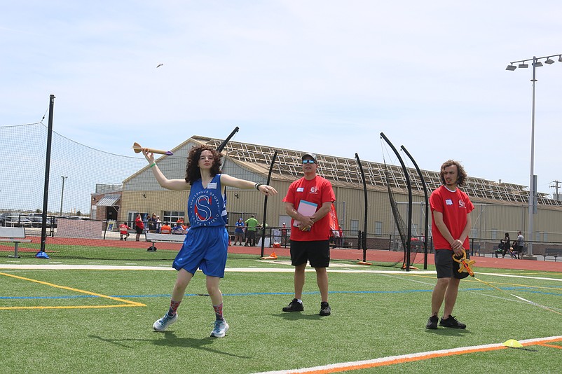 Special Olympics athlete Mia Palmer, of Upper Township, competes in the mini-javelin throw.