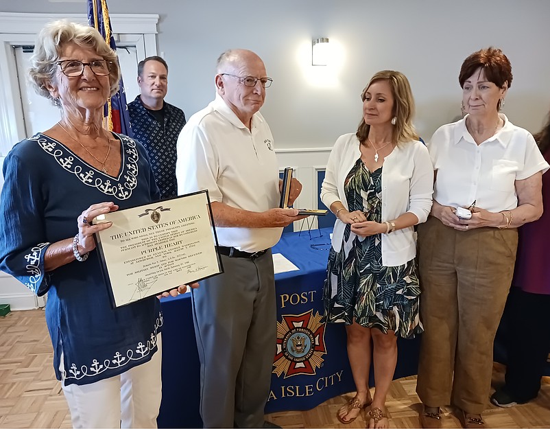 From left, Jean and Joe O'Connor join with Stephanie Beehler and her mother, Mary Ann Niemi, during the ceremony.