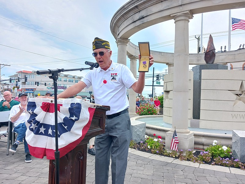 Mark Lloyd, commander of Sea Isle City's VFW Post 1963, displays the Purple Heart awarded in honor of World War II Private Leo F. Weber.