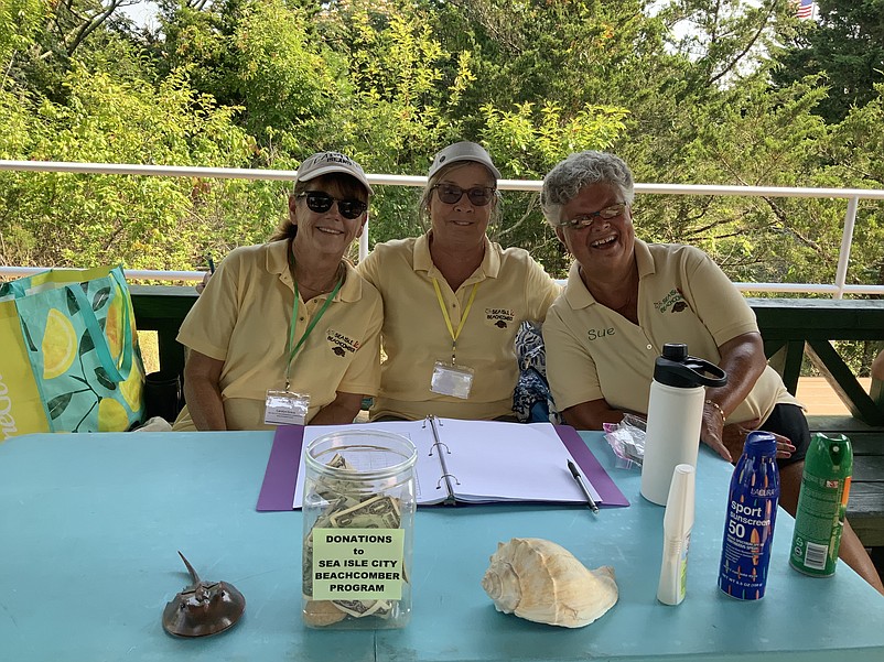 From left, beachcombing volunteers Carolyn Greco and Dee Dunbar and director Sue Williamson.