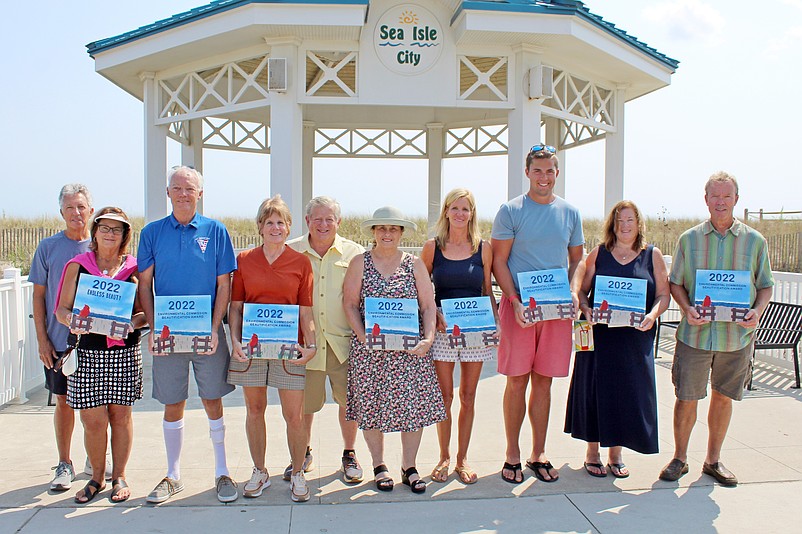 Winners of Sea Isle's 2022 property beautification contest accept their awards. (Photo courtesy of Sea Isle City)