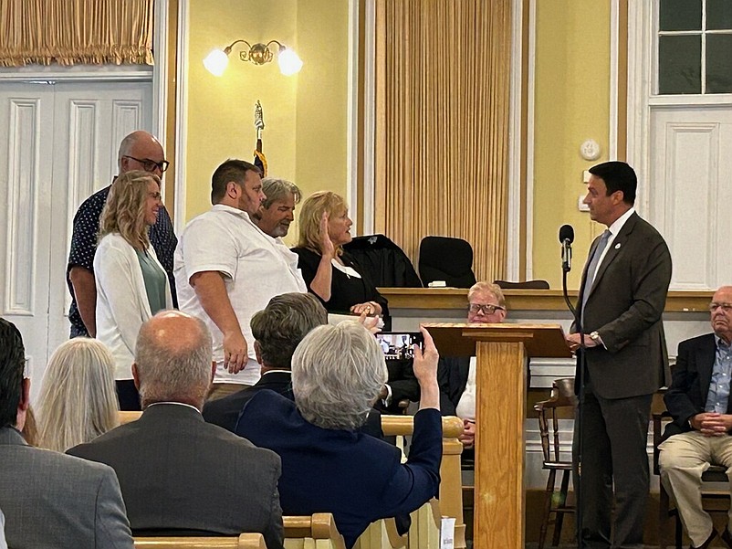 Sen. Michael Testa administers the oath of office for Cape May County Surrogate E. Marie Hayes, who is joined by her family. (Photos courtesy of E. Marie Hayes)