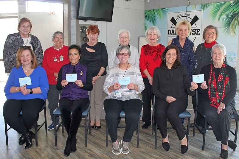 Board members from the Women's Civic Club, standing, are joined by representatives from charities that received donations during the 2022 fundraiser luncheon. (Photo courtesy of Sea Isle City)