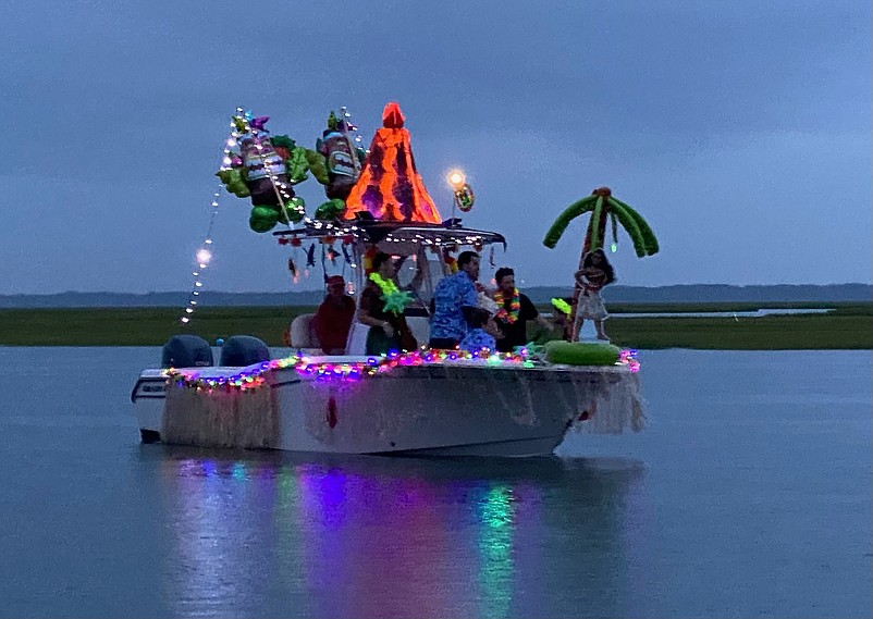 The flotilla is held at night to showcase the boats decorated in lights.