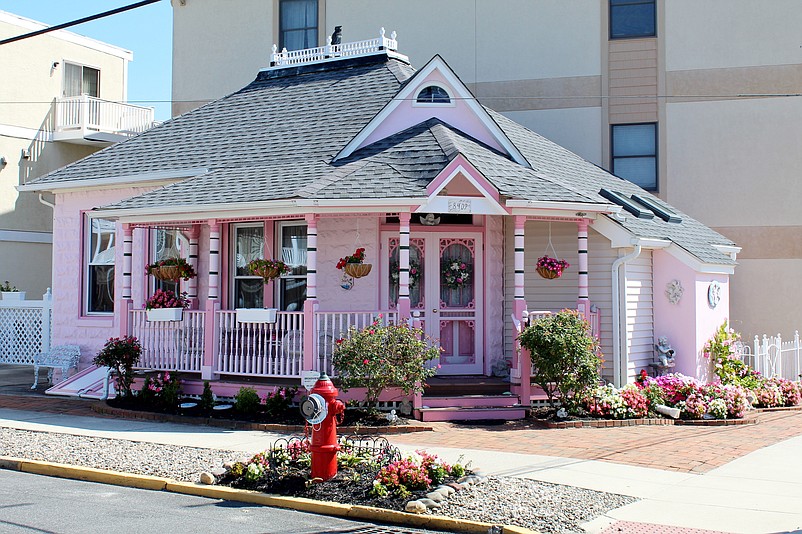 Accented with flowers, images of angels, and gingerbread trim, the diminutive “Pink Cherub House” at 8409 East Landis Avenue was among the eight homes that received a 2023 Beautification Award. 