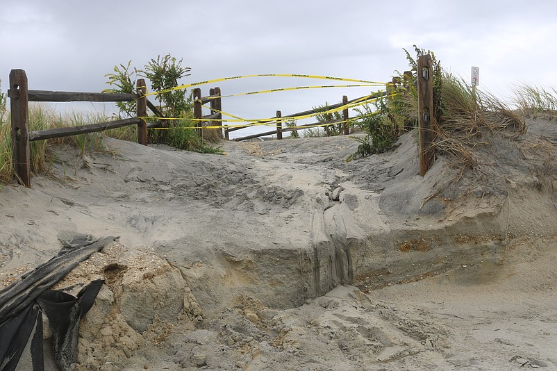 Some beach pathways are closed due to severe erosion.