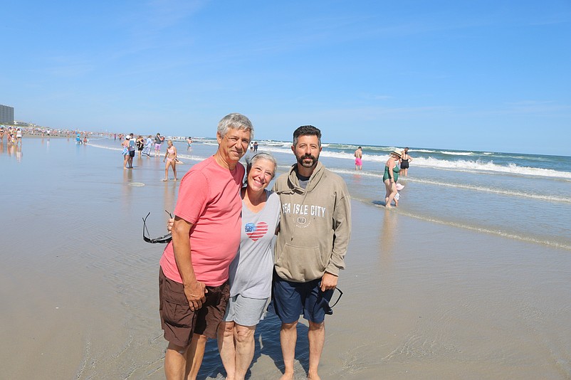 Larry and Darlene Lane and their son, Larry Jr., enjoy the beach.