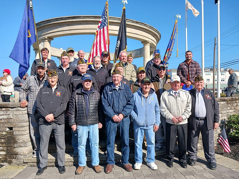 Veterans gather for a group photo at the Veterans Park monument during Sea Isle City's Veterans Day ceremony in 2023. Now, the women who have served the country in the military will also be recognized.