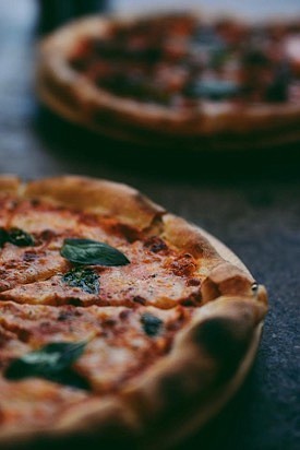 Source: Shayan Ramesht Via Unsplash - https://unsplash.com/photos/selective-focus-photography-of-two-pizzas-exSEmuA7R7k