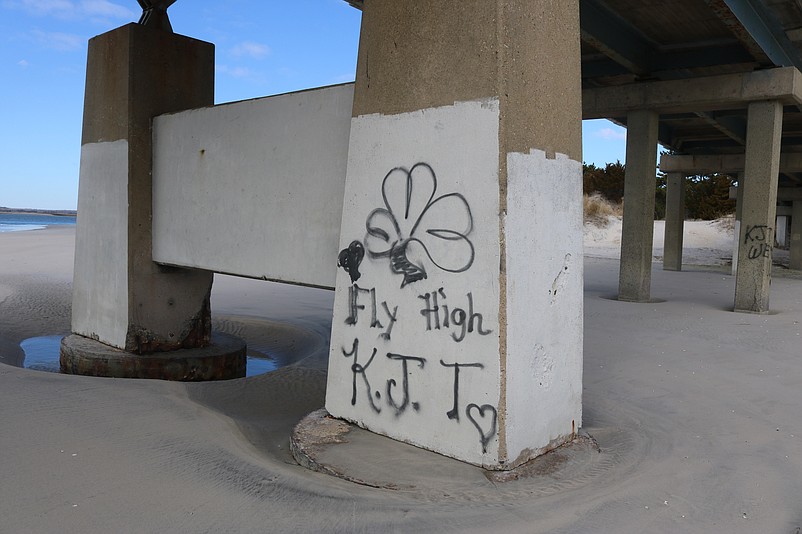 Coats of white paint cover most of the graffiti on the Townsends Inlet Bridge, but some still remains.