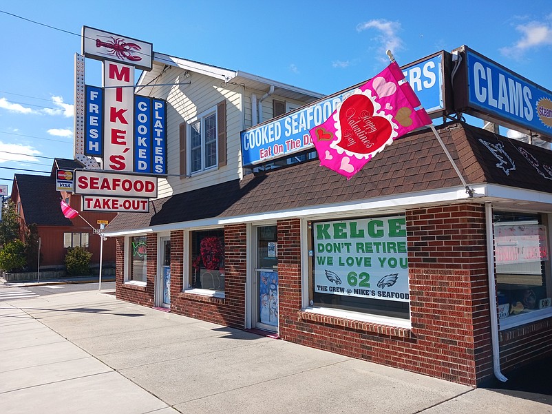 The old "Don't Retire" sign displayed in the front window at Mike's Seafood expresses Sea Isle City's love for Jason Kelce.