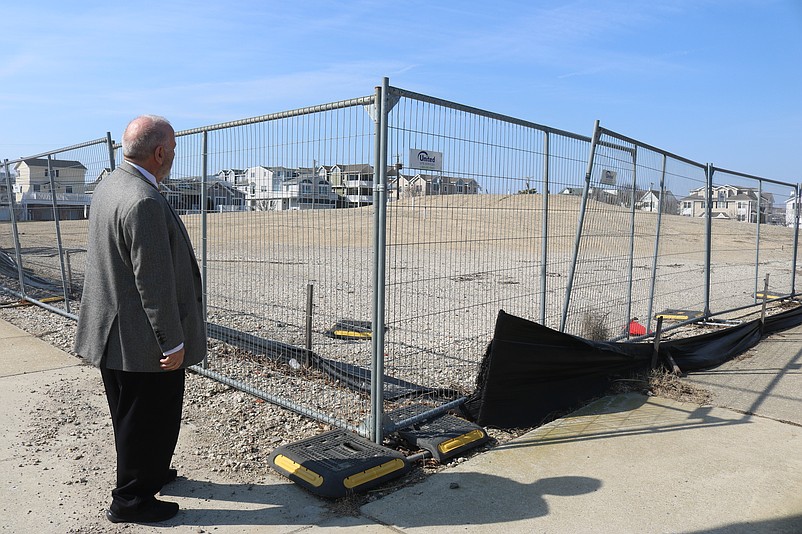 Mayor Leonard Desiderio looks over the construction site at the corner of Central Avenue and 45th Street.