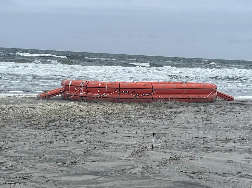 A lifesaving raft ends up on Sea Isle City's beach near 73rd Street. (Courtesy of John Clements on Facebook)