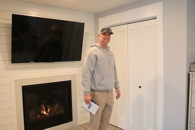 Dean Dooley gives a tour of the interior of an Ocean City home on Central Avenue he painted.