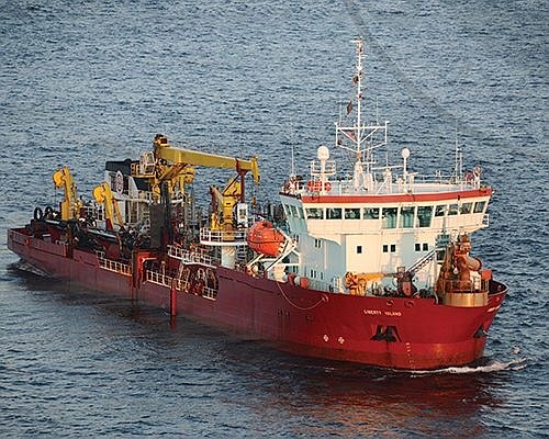 The dredge "Liberty Island" is pumping sand onto the beaches for the project. (Courtesy of Great Lakes Dredge &amp; Dock Co.)