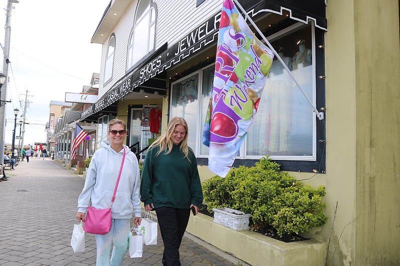 Tina Kester and her daughter, Katie, make the rounds at the downtown shops.